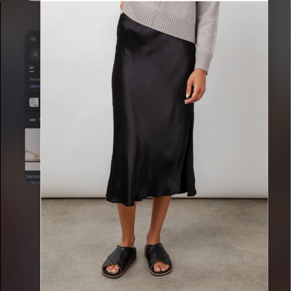 Rails black satin midi skirt. Like new. Size small.